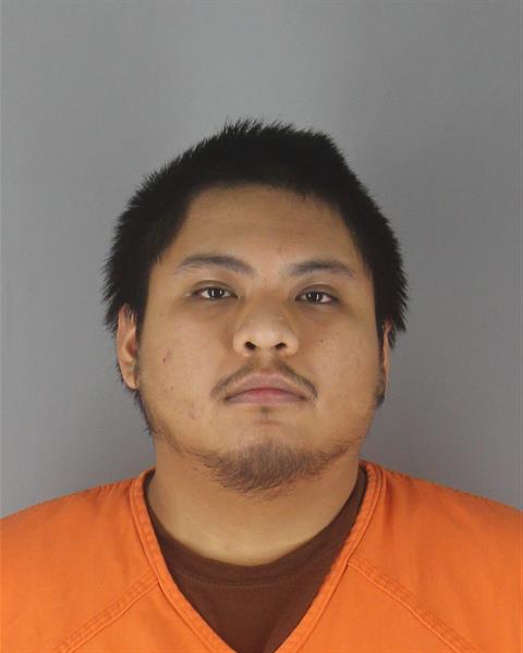Booking photo of Kenley Roldan Amigon