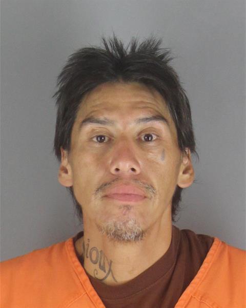 Booking photo of John Hedine
