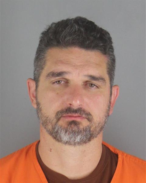 Booking photo of Garrett Cunningham