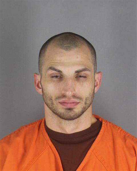 Booking photo of Logan Huber