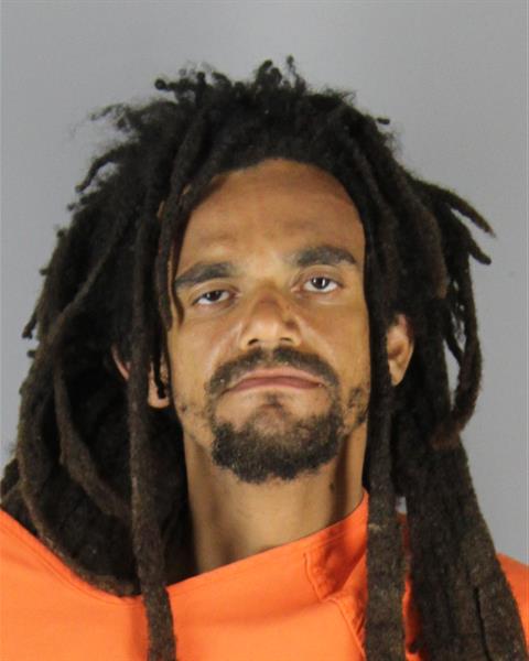 Booking photo of Andrew Ezidiegwu