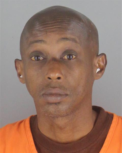 Booking photo of Omar Omar