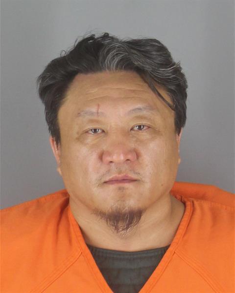 Wang Xiong booking photo