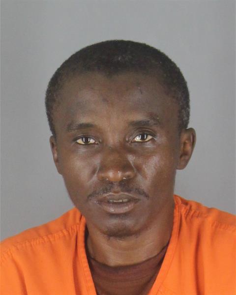 Booking photo of Alou Mwah