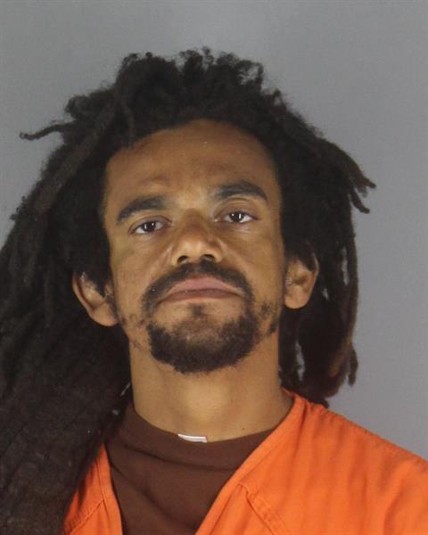 Booking photo of Andrew Ezidiegwu