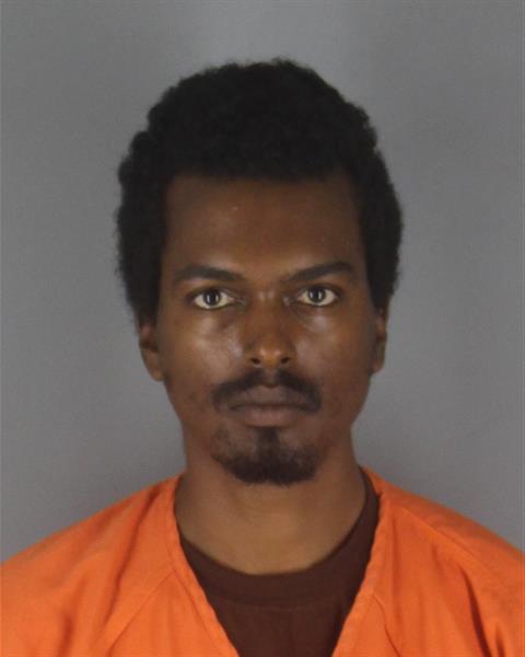 Booking photo of Samuel Melaku