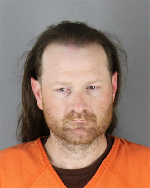 Booking photo of John Ullmann
