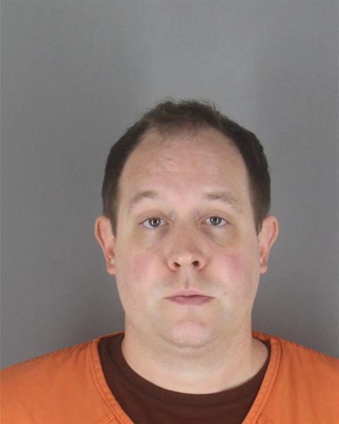 Booking photo of Ryan Huber