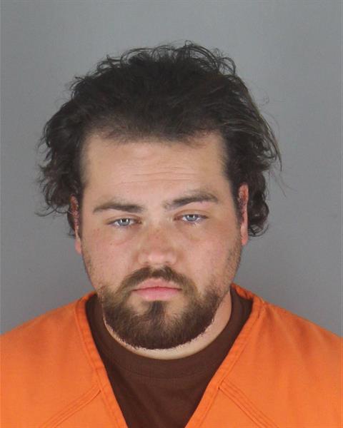 Booking photo of Jordan Hartman