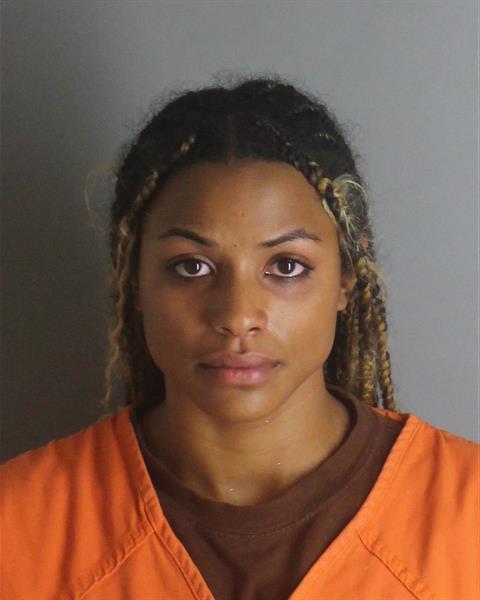 Booking photo of Cymone Dotson