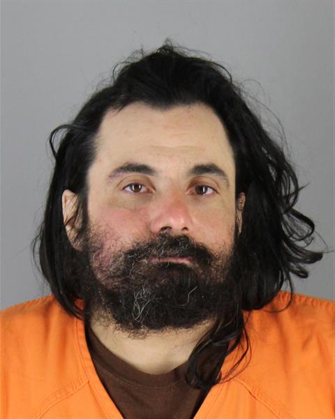 Booking photo of Christopher Caputo