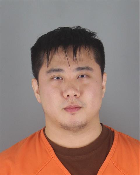 Booking photo of Guicai Huang