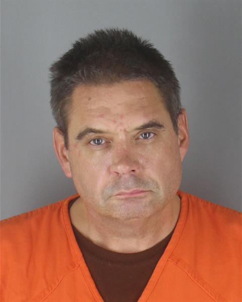 Booking photo of Christopher Olson