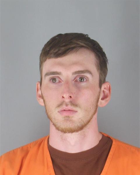 Booking photo of Riley Neuenschwander