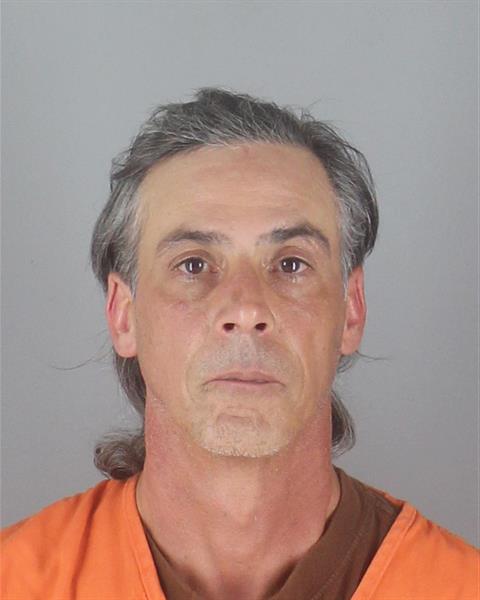 Booking photo of Kevin Mello