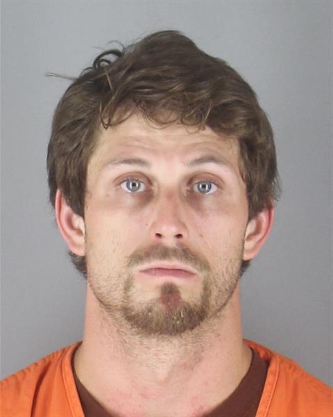 Booking photo of Eric Cousineau