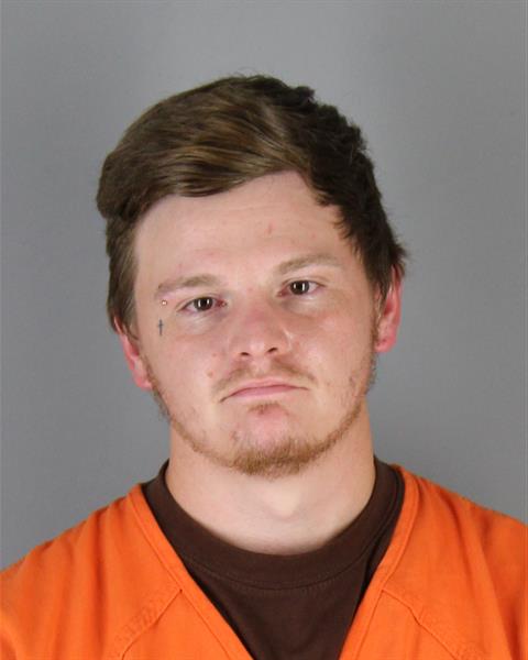 Booking photo of Adam Brown