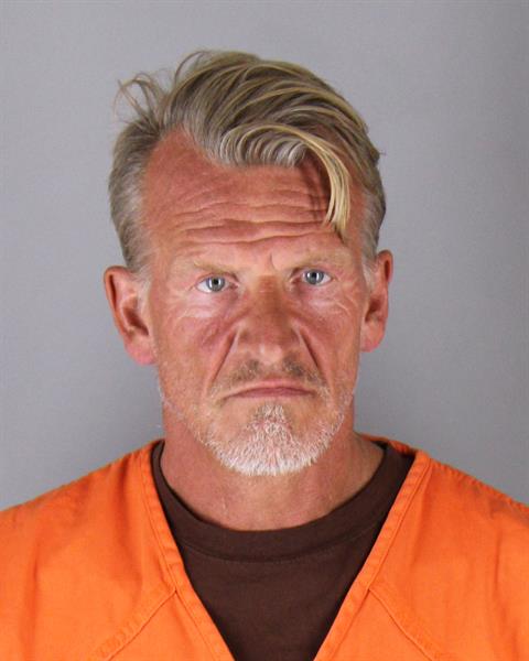 Booking photo of John Reese