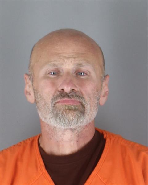 Booking photo of Russell Brown