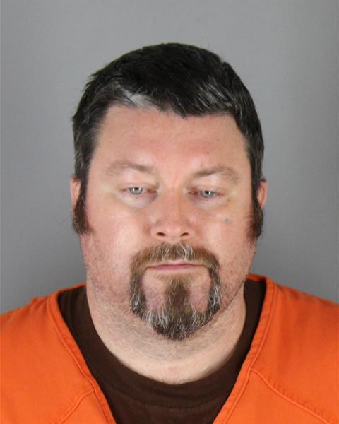 Booking photo of Cory Christensen
