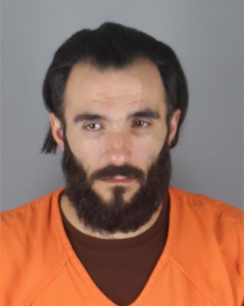 Booking photo of Adam Sadd