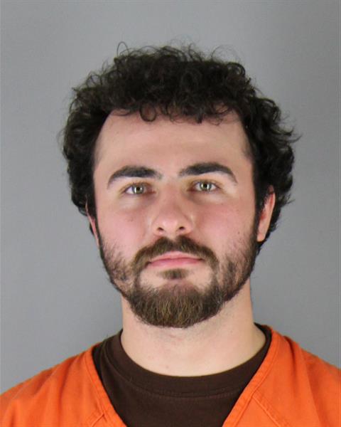 Booking photo of Travis Quade