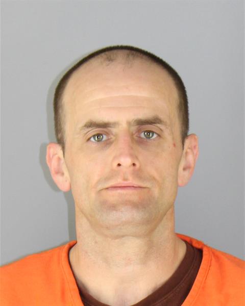 Booking photo of Derek Towne