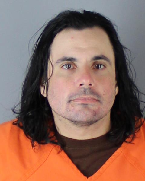 Booking photo of Christopher Caputo