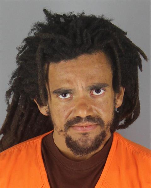 Booking photo of Andrew Ezidiegwu