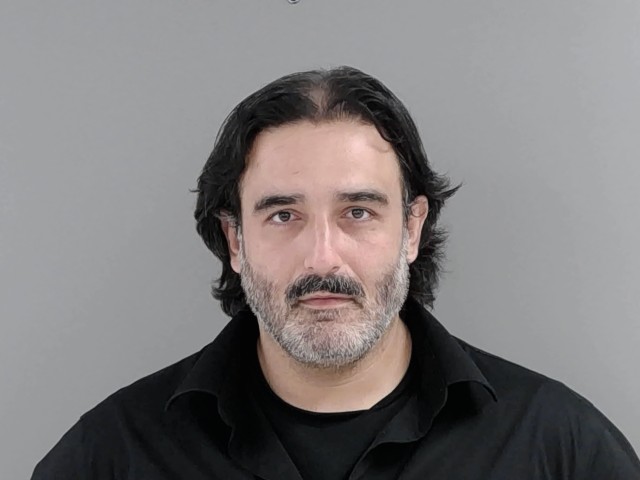 Booking photo of Mehdi Kouzad