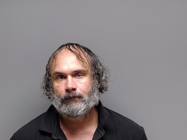 Booking photo of Michael Stuart Hebner