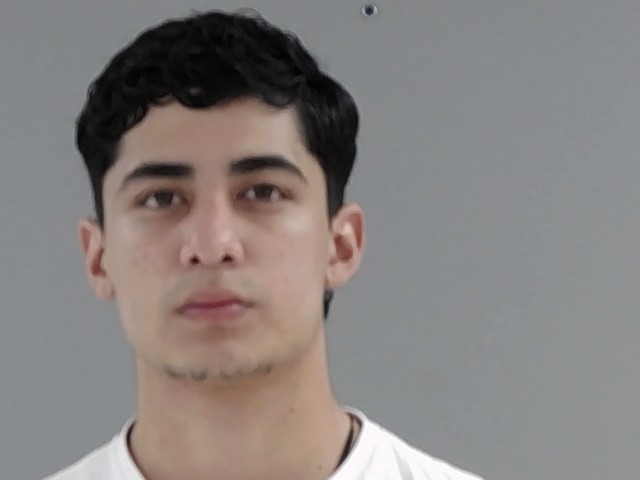 Booking photo of Andres Flores Armijos
