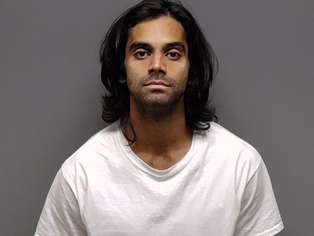 Booking photo of Minhaj Alam Khan