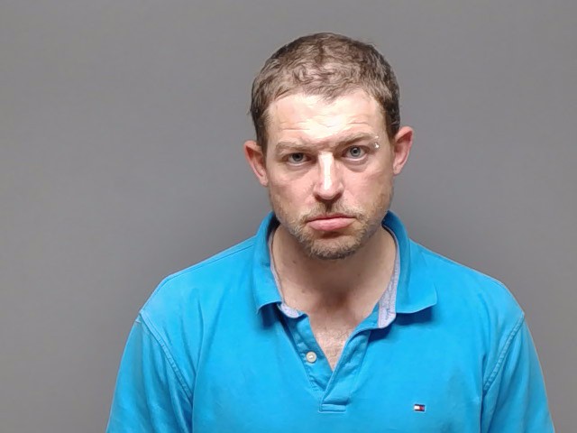 Booking photo of Christopher Ryan Hendricks