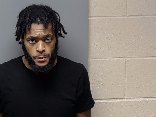 Booking photo of Gregory Tyrone Alston Jr