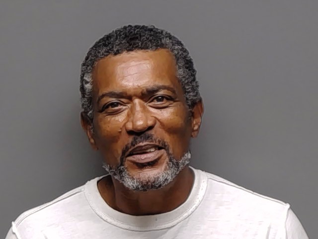 Booking photo of Herbert Horace Cousins Jr