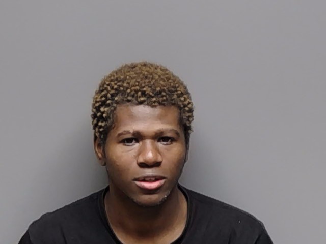 Booking photo of Samuel Kamanda