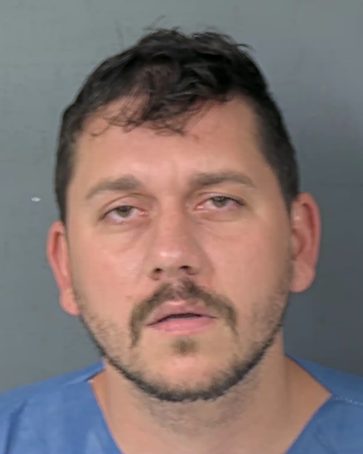 Booking photo of Devan Michael Machado