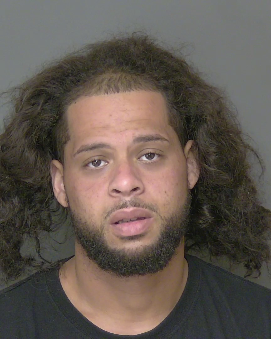 Booking photo of Christopher Minier