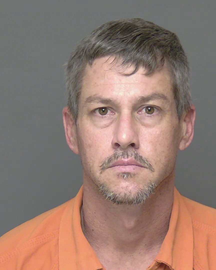 Booking photo of Aaron Brown
