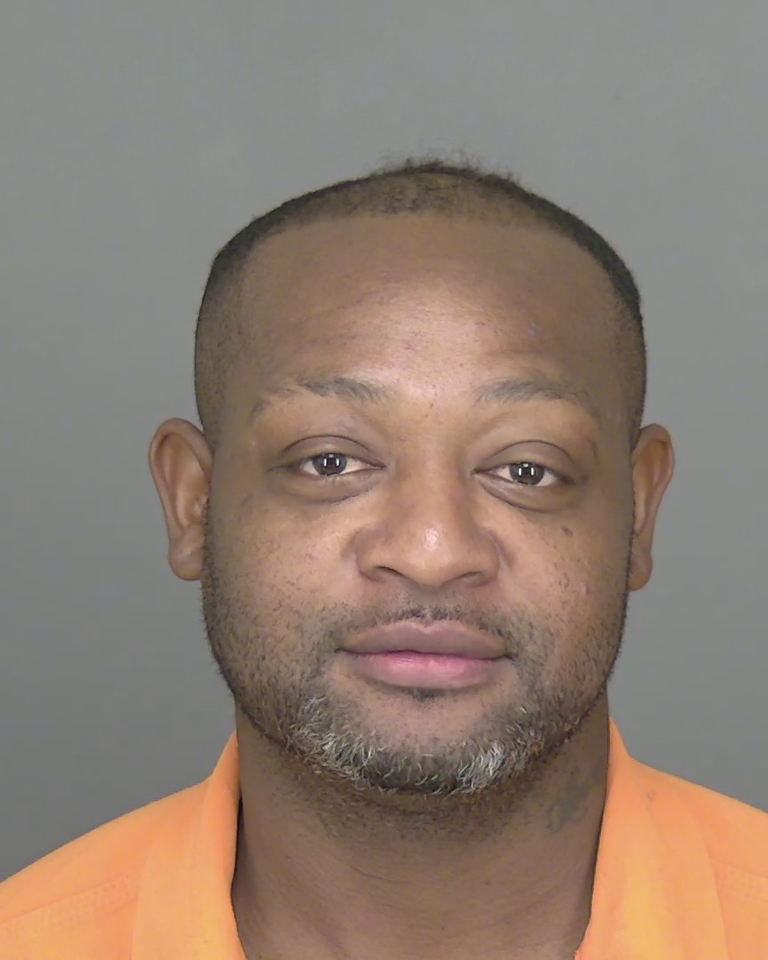 Booking photo of Travis Holder