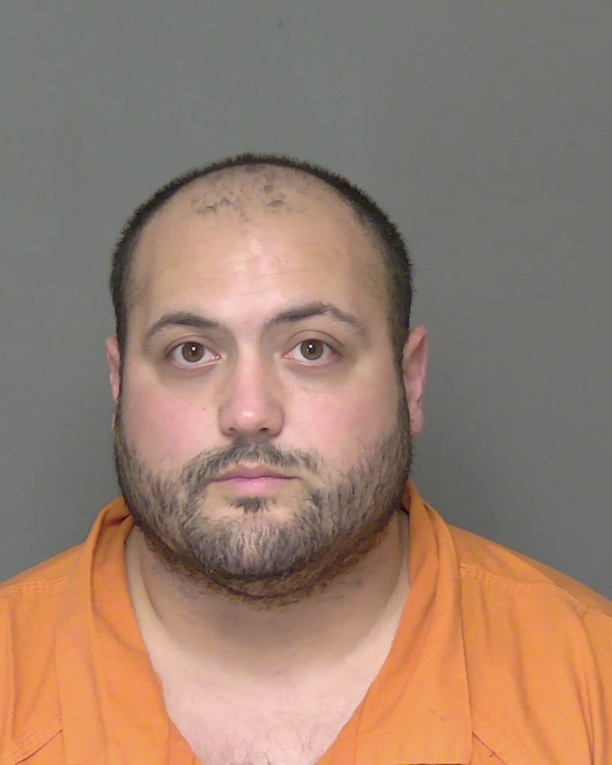 Booking photo of Steven Corujo