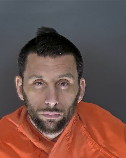 Booking photo of Christopher Evans