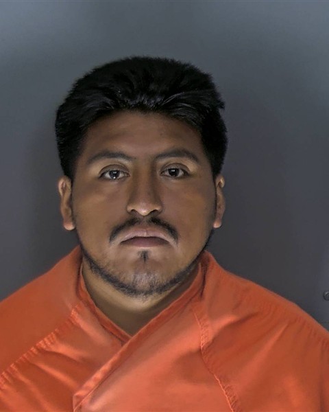 Booking photo of Carlos Mendoza