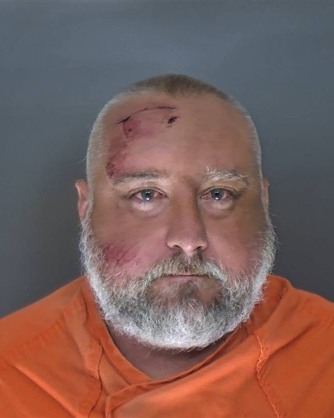 Booking photo of Justin Brown