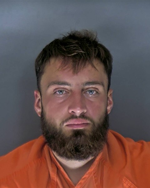 Booking photo of Scott Reinfurt