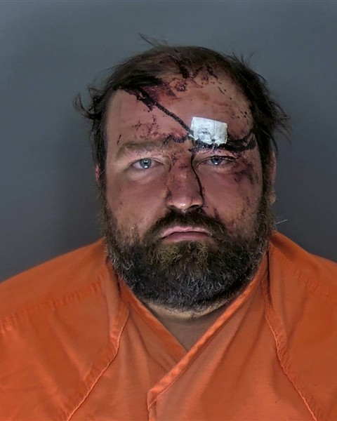Booking photo of Colby Huggins