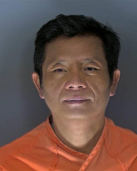 Booking photo of Quy Tran