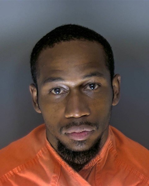 Booking photo of Darius Miller