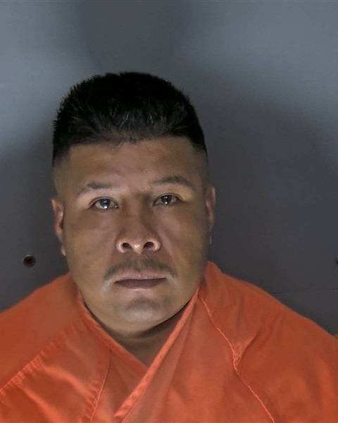 Booking photo of Simon Angeles Reyes
